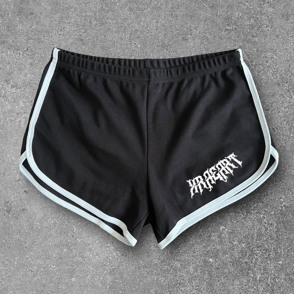 
                  
                    Black goth Vampire Booty Shorts with white trim. Tattoo inspired Dark Art by Xraeart Clothing alternative streetwear.
                  
                