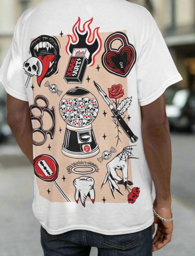 
                  
                    White short sleeve, tattoo flash t-shirt with switchblade, brass knuckles, razor blades and locket. Tattoo inspired Dark Art by Xraeart Clothing alternative streetwear.
                  
                